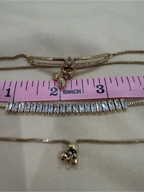Vince Camuto Tennis Slider Bracelets with Clear Baguette Crystals